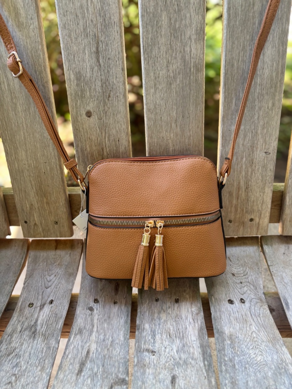 New w/Tags Vegan leather Donna & Becky Dome Crossbody with Tassel Zip